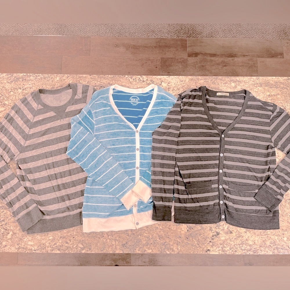 Three men’s long sleeve light weight shirts